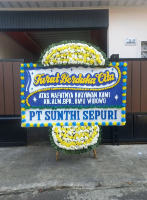 Papan Bunga Duka di Parado