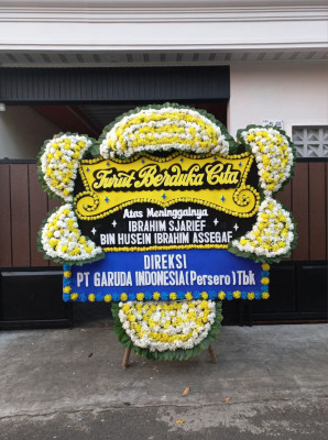 Papan Bunga Duka di Parado