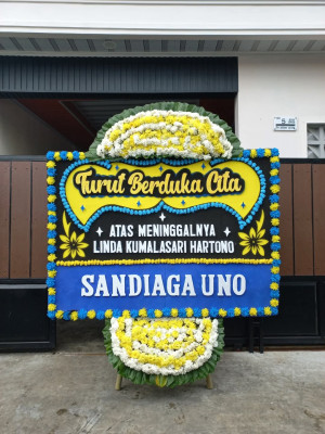 Papan Bunga Duka di Parado